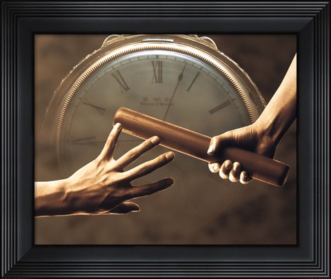 Framed Close up of two runners hands passing the baton in relay race in front of old European clock face Print