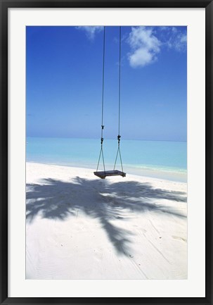 Framed Swing on the beach above palm tree shadow Print