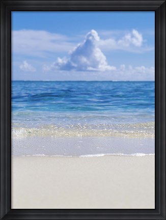 Framed Tropical beach with blue skies in background Print