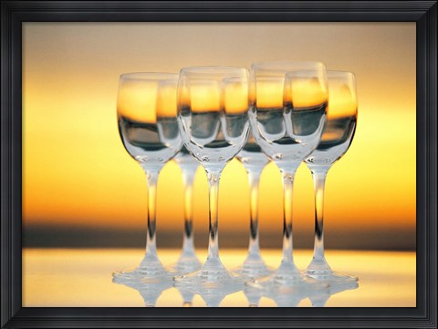 Framed Row Of Wineglasses Against Golden Yellow shiny Background Print