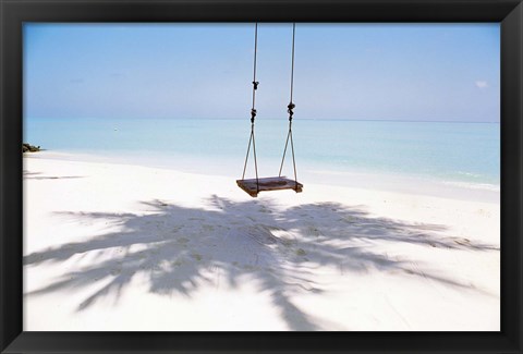 Framed Beach swing and shadow of palm tree on sand Print