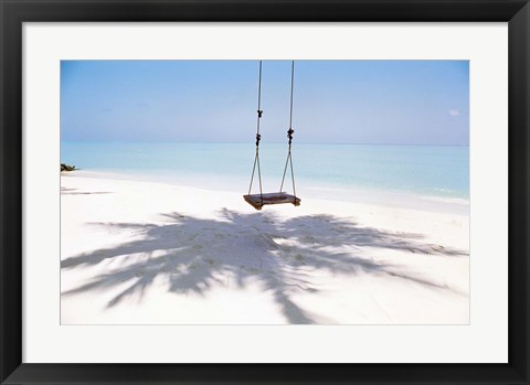 Framed Beach swing and shadow of palm tree on sand Print