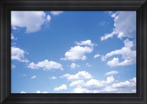 Framed Cumulus Clouds Against a Bright Blue Sky Print