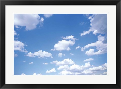 Framed Cumulus Clouds Against a Bright Blue Sky Print