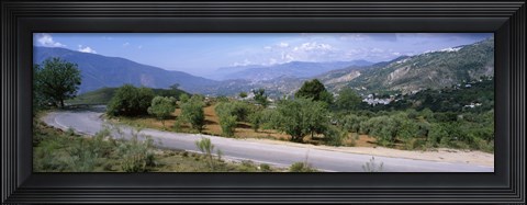 Framed Road passing through a landscape with mountains in the background, Andalucian Sierra Nevada, Andalusia, Spain Print