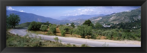 Framed Road passing through a landscape with mountains in the background, Andalucian Sierra Nevada, Andalusia, Spain Print