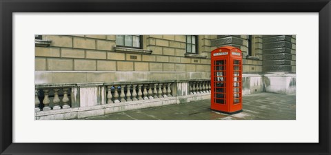 Framed Telephone booth at the roadside, London, England Print