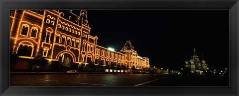 Framed Facade of a building lit up at night, GUM, Red Square, Moscow, Russia Print