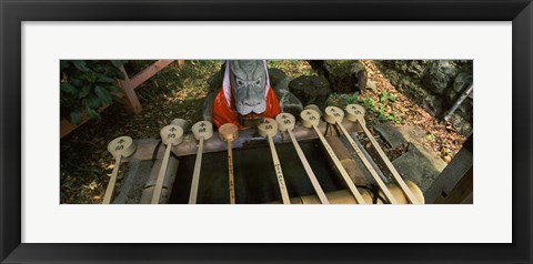 Framed Water ladles in a shrine, Fushimi Inari-Taisha, Fushimi Ward, Kyoto, Kyoto Prefecture, Kinki Region, Honshu, Japan Print