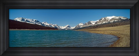 Framed Lake with snow covered mountains in the background, Sherburne Lake, US Glacier National Park, Montana, USA Print