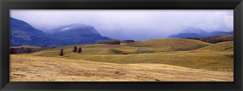 Framed Rolling landscape with mountains in the background, East Glacier Park, Glacier County, Montana, USA Print