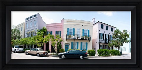 Framed Rainbow row colorful houses along a street, East Bay Street, Charleston, South Carolina, USA Print