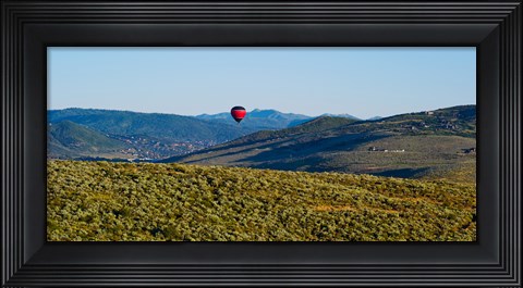 Framed Hot air balloon flying in a valley, Park City, Utah, USA Print
