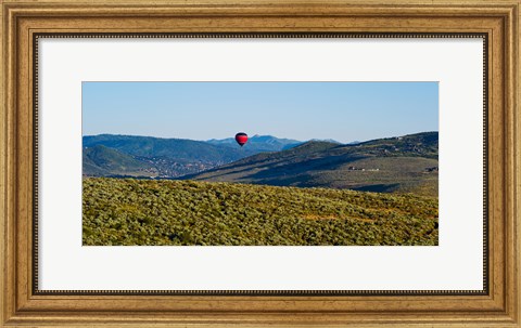 Framed Hot air balloon flying in a valley, Park City, Utah, USA Print