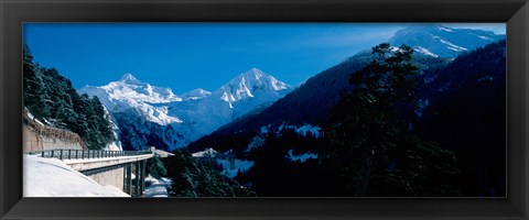 Framed Bridge through Snowcapped mountain range, Valais Canton, Switzerland Print