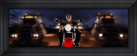 Framed Motorcycle rider between two semi trucks Print