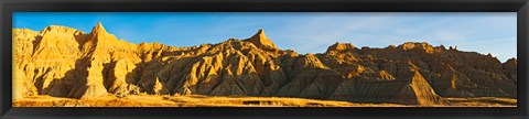 Framed Rock formations on a landscape in golden light, Saddle Pass Trail, Badlands National Park, South Dakota, USA Print