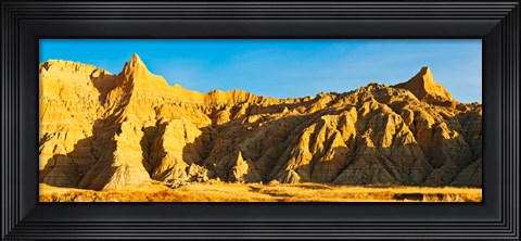 Framed Sculpted sandstone spires on a landscape, Saddle Pass Trail, Badlands National Park, South Dakota, USA Print