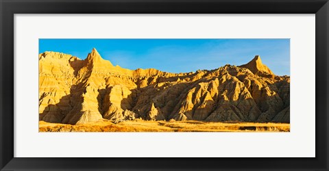 Framed Sculpted sandstone spires on a landscape, Saddle Pass Trail, Badlands National Park, South Dakota, USA Print