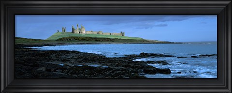 Framed Dunstanburgh Castle at the coast, Northumberland, England Print