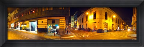 Framed Shops along a street at night, Lima, Peru Print