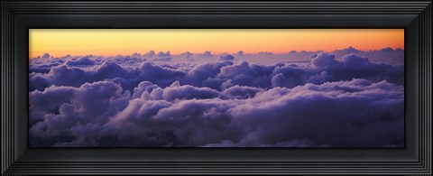 Framed Sunset above the clouds Print