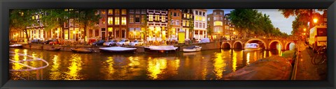 Framed Buildings along a canal at dusk, Amsterdam, Netherlands Print