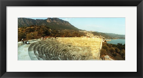 Framed Ancient antique theater at sunset with the Mediterranean sea in the background, Kas, Antalya Province, Turkey Print