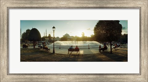 Framed People sitting at a fountain with Blue Mosque in the background, Istanbul, Turkey Print