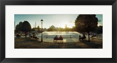 Framed People sitting at a fountain with Blue Mosque in the background, Istanbul, Turkey Print