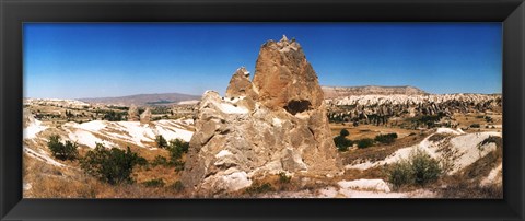 Framed Single rock in a landscape of rock formations, Cappadocia, Central Anatolia Region, Turkey Print