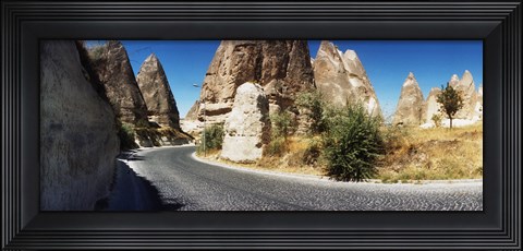 Framed Winding road passing through rocks, Cappadocia, Central Anatolia Region, Turkey Print