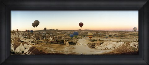 Framed Hot air balloons traversing Cappadocia, Central Anatolia Region, Turkey Print