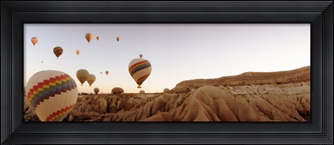 Framed Hot air balloons crossing a plateau, Cappadocia, Central Anatolia Region, Turkey Print