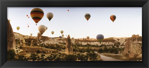 Framed Hot air balloons over landscape at sunrise, Cappadocia, Central Anatolia Region, Turkey Print