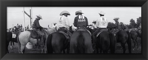 Framed Cowboys on horses at rodeo, Wichita Falls, Texas, USA Print