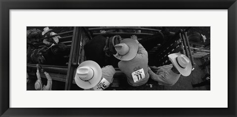 Framed High angle view of cowboys with horses at rodeo, Wichita Falls, Texas, USA Print