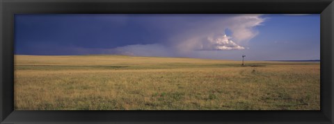 Framed Lone windmill in a field, New Mexico, USA Print