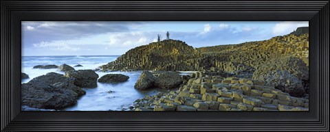 Framed People climbing on rocks at Giant's Causeway, Bushmills, County Antrim, Northern Ireland Print