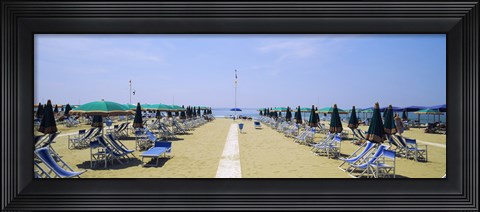 Framed Deck chairs and umbrellas on the beach, Viareggio, Tuscany, Italy Print