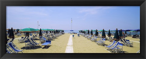 Framed Deck chairs and umbrellas on the beach, Viareggio, Tuscany, Italy Print