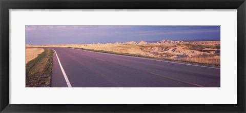 Framed Road passing through the Badlands National Park, South Dakota Print