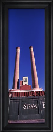 Framed Low angle view of two smoke stacks at Steam Plant Square, Spokane, Washington State Print