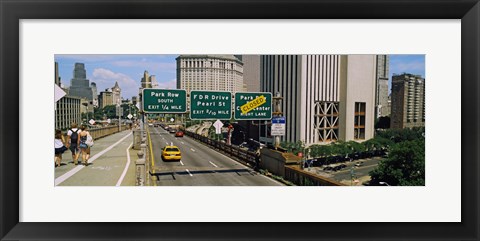 Framed Suspension bridge with buildings in a city, Brooklyn Bridge, New York City, New York State, USA Print