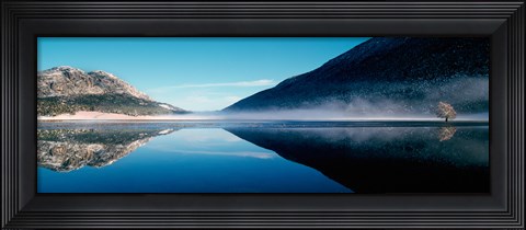 Framed Reflection of a mountain with snowy trees on a lake in winter afternoon, Cote d&#39;Azur, France Print