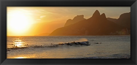 Framed Surfers at sunset on Ipanema Beach, Rio De Janeiro, Brazil Print