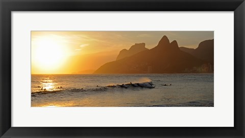 Framed Surfers at sunset on Ipanema Beach, Rio De Janeiro, Brazil Print