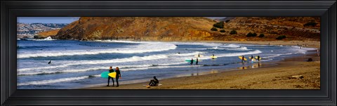 Framed Surfers on the beach, California, USA Print