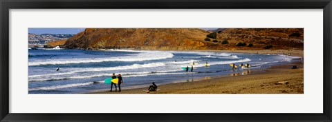 Framed Surfers on the beach, California, USA Print