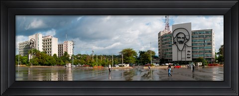 Framed Metal sculptures of Camilo Cienfuegos and Che Guevara on two buildings, Revolutionary Square, Vedado, Havana, Cuba Print